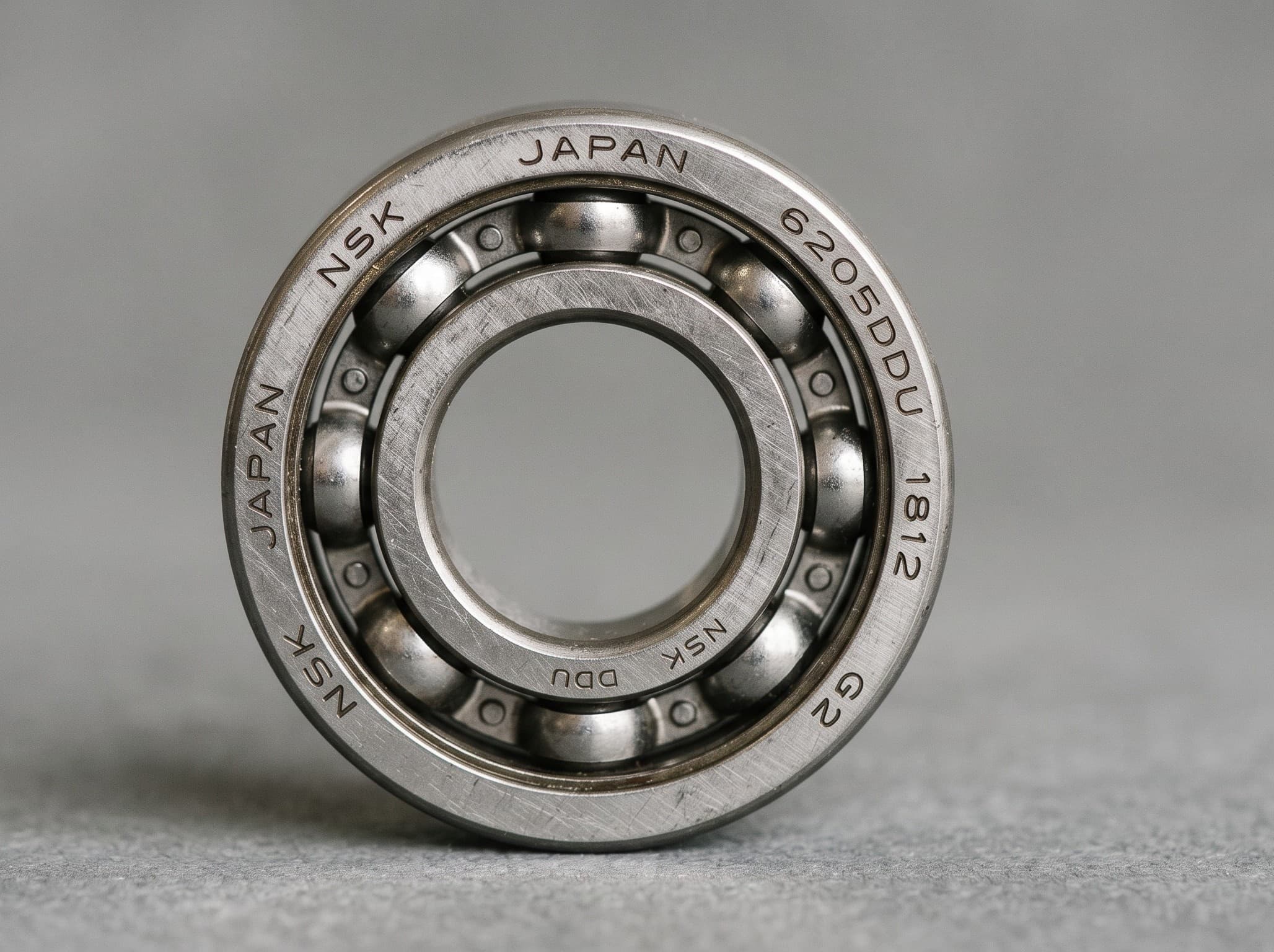 Close-up bearing face with readable markings